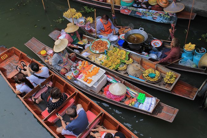 Half-Day Railway Market and Floating Market Tour in Thailand - Damnoen Saduak Floating Market: Longtail Boat Views and Canal Life
