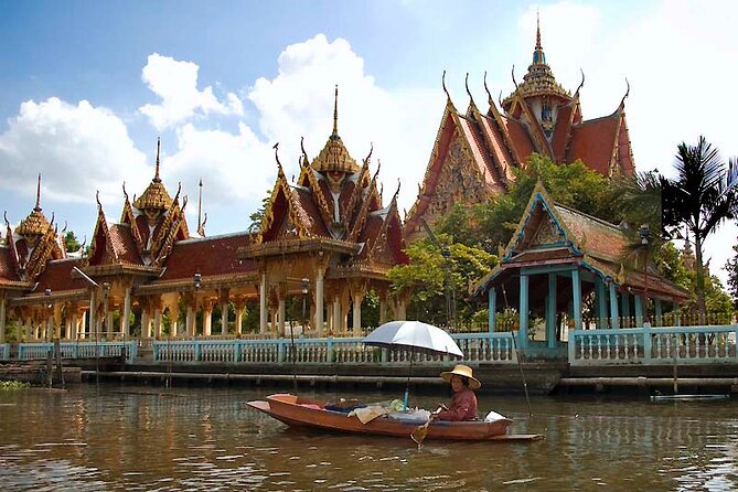 KL | Bangkok: 2-Hour Canal Tour by Teak Boat - Chao Phraya crossing: Wat Arun, Democracy Monument, and Dusit Palace
