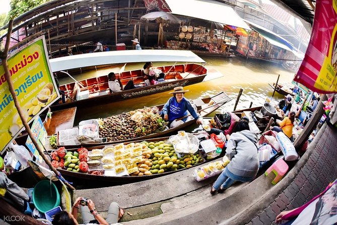 Maeklong Railway Market and Floating Market Tour from Bangkok - Stop 1: Maeklong Railway Market and the Umbrella Pull-Down Moment