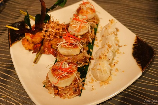 Manohra 5-Star Luxury Dinner Cruise with Pre-Canapés in Bangkok - Asiatique Riverfront and Rama VIII Bridge: modern Bangkok from the water