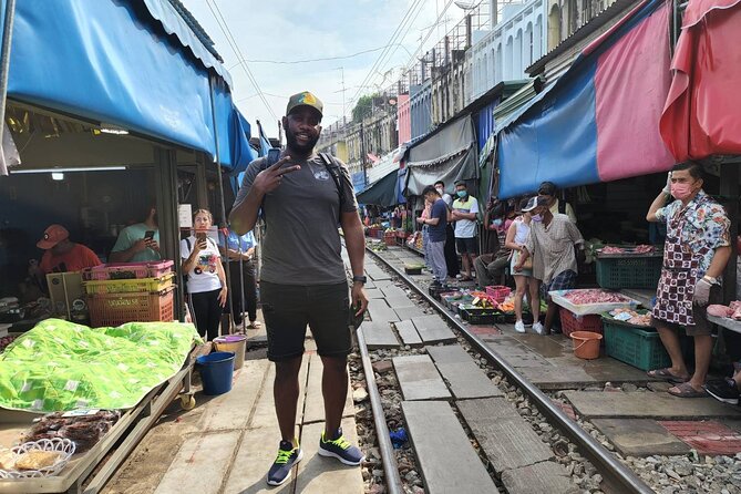 Private Amphawa & Maeklong Railway Market Day Tour with Fireflies - Mae Klong Railway Market: The moment the railway steals the show