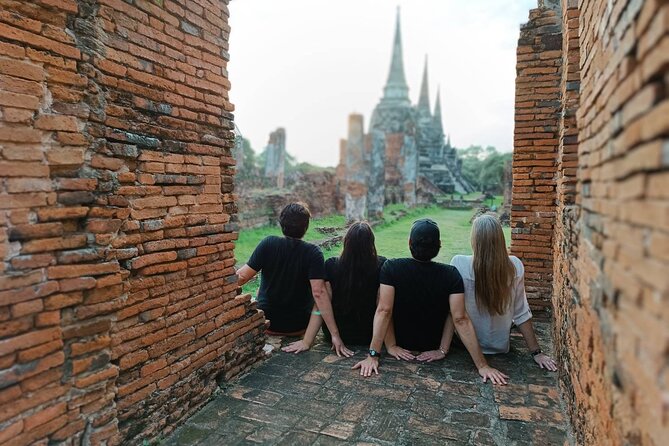 PRIVATE Ayutthaya + SUNSET Boat Tour + Light up The NIGHT - Wat Mahathat: headless Buddha images and the feel of crumbling age