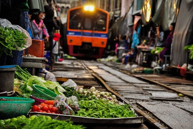 Private Damnoen Saduak and Maeklong Railway Market Tour(min 2pax) - Private transportation, insurance, and a guide who helps you pick priorities