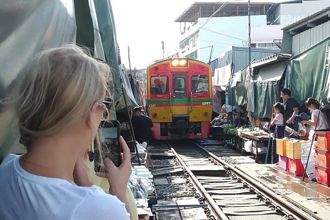Private Excursion to Maeklong Railway & Amphawa Floating Markets - Wat Bang Kung: Ancient Trees and Muay Thai Warrior-Style Statues