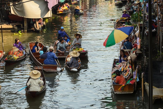 Private Excursion to Maeklong Railway and Floating Markets - Stop 2: Long-Tail Boat Canal Time to Damnoen Saduak