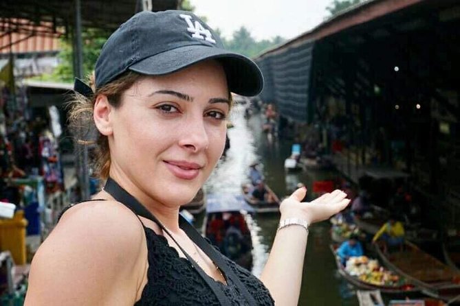 Private Excursion to Maeklong Railway and Floating Markets - Stop 1: Hoop Rom Market and the Train-Through-Stalls Moment