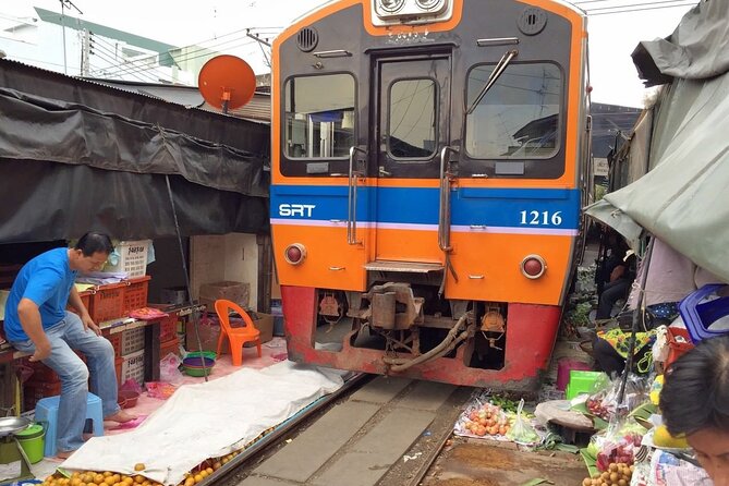 Private Floating Market and Maeklong Railway Market Day Tour - Maeklong Railway Market: Watching a Train Share the Same Space as Shopping