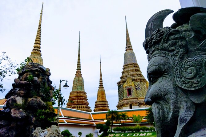 Private Mysterious Bangkok & Grand Palace, Tuk Tuk, Boat & Lunch - Khlong Bang Luang Artist House and the long-tail boat pass