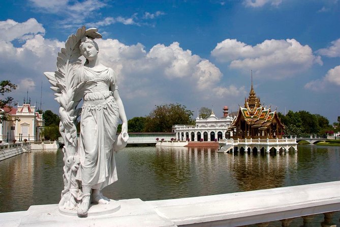 Private Tour : Ayutthaya Sightseeing by Coach return by Cruise - Wat Mahathat: the Buddha head fused into a Bodhi tree