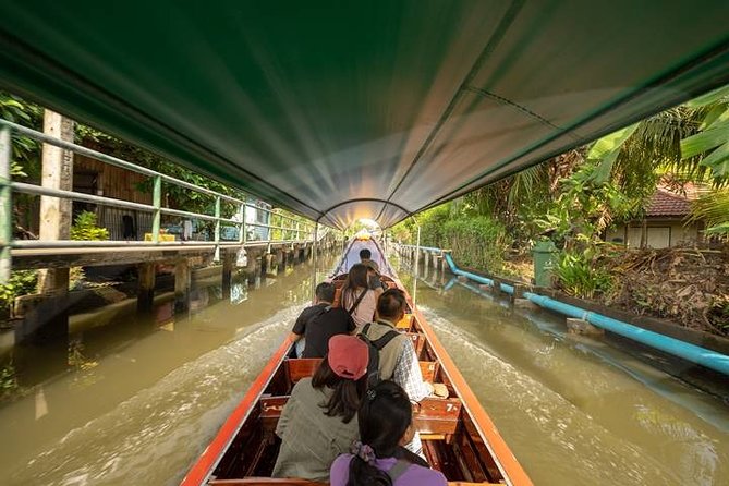 Private Tour: Floating Markets and Suan Sampran Day Trip from Bangkok - Stop 2: Sam Phran Riverside Thai Village for Thai skills, food, and performances