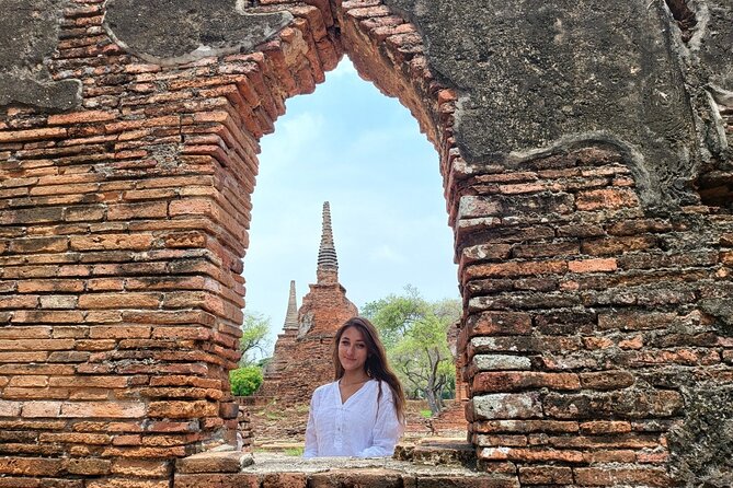 Private Tour to Ayutthaya, World Heritage Site with Boat Tour - Wat Mahathat: the Bodhi tree roots and the Buddha head