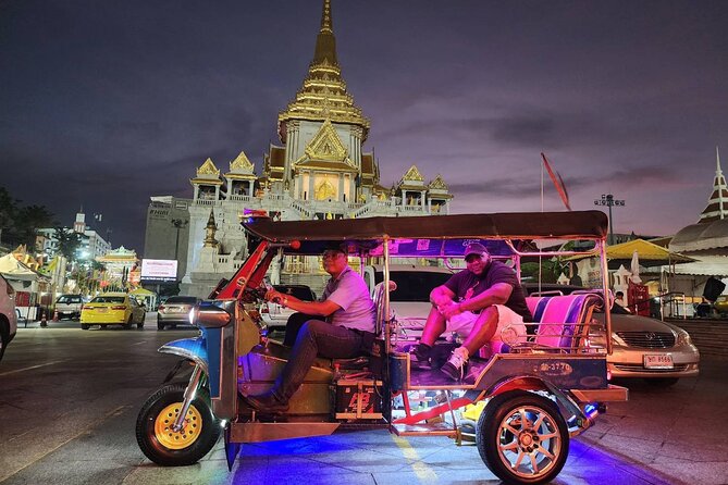 Private Tuk Tuk Night Adventure with Dinner - Passing the Grand Palace for nighttime photos
