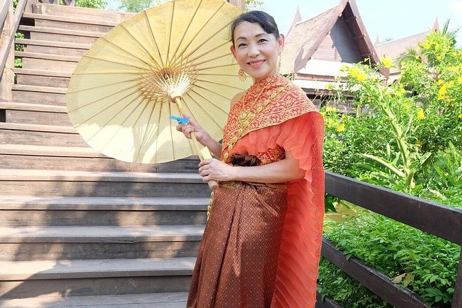 Proposals in Thai Costume with Photoshoot - Stop 1: Pak Khlong Flower Talat Original and a proposal planned among the blooms