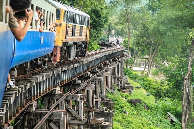 Small Group: Kanchanaburi Death Railway, Erawan Waterfall and Elephant - Tham Kra Sae cave: Buddha inside, POW history outside