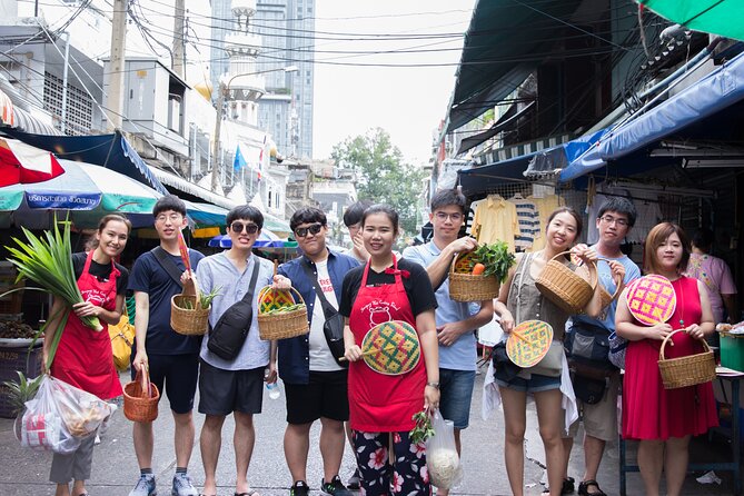 Sompong Thai Cooking School - The morning market walk: herbs, coconuts, and what to buy