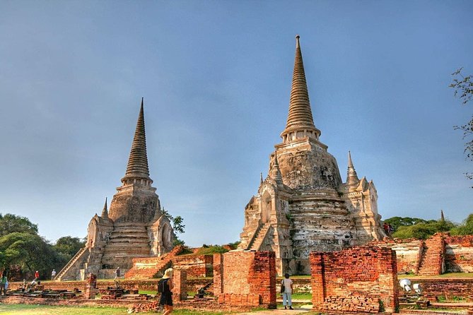 Sunset Sail, Glittering Tempels at Afternoon Ayutthaya Tours - Wat Mahathat: the famous Buddha head in tree roots