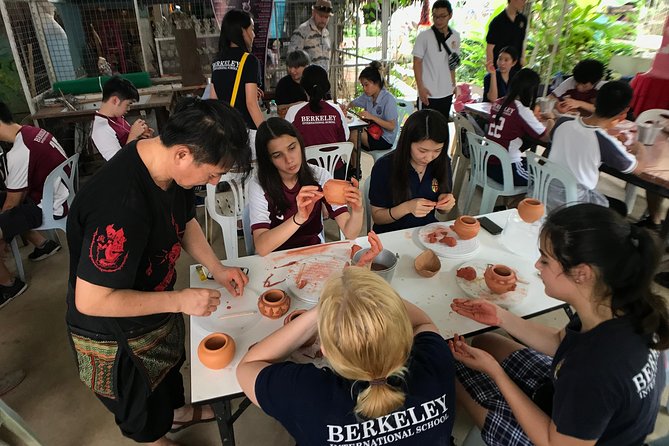 The Story of Handicrafts Full Day Experience from Bangkok - Ko Kret by bike: homes, vegetation, and temple wandering